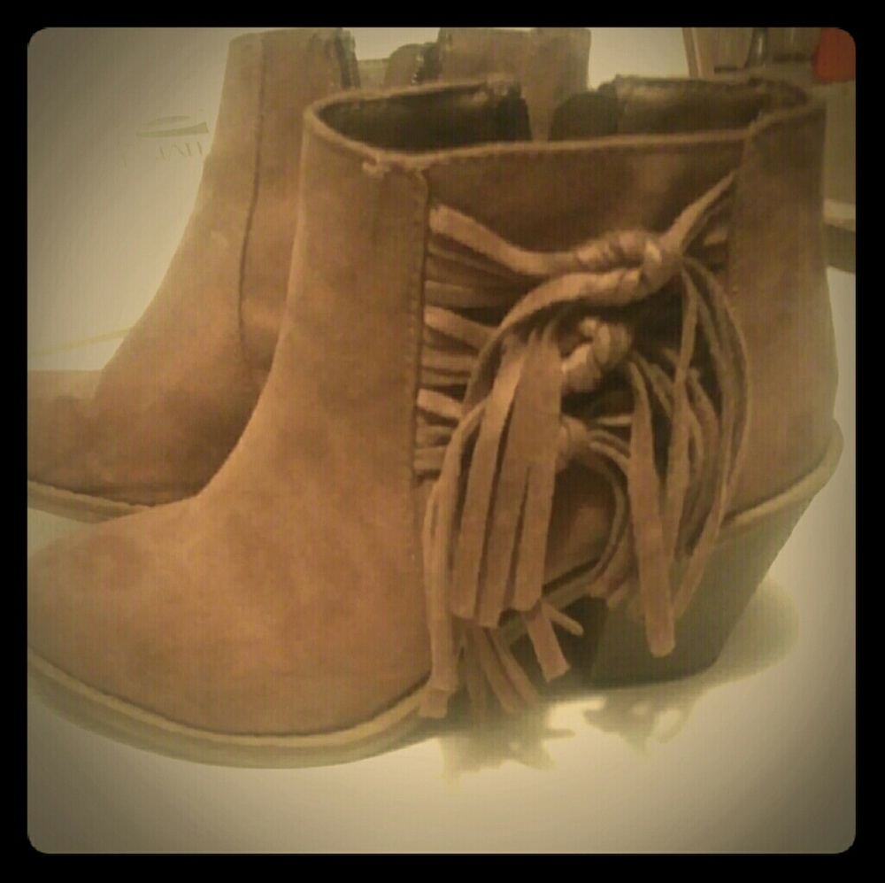 Brown fringe boots